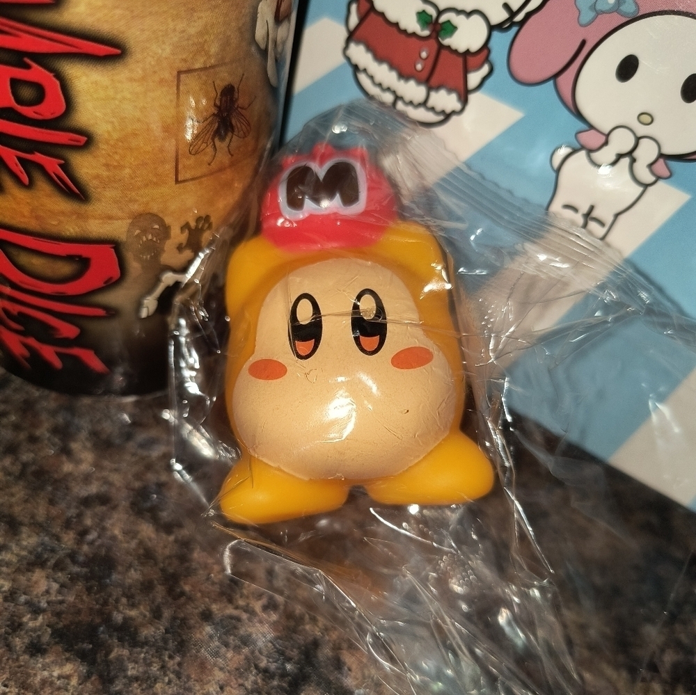 Yellow Character Figurine with Red Hat Kirby yellow orange Nintendo figure